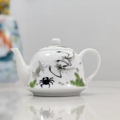 Playful River Shrimp & Crab White Glaze Teapot