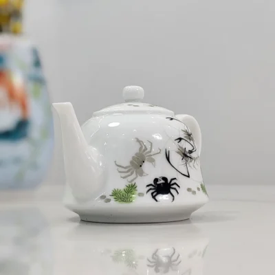 Playful River Shrimp & Crab White Glaze Teapot