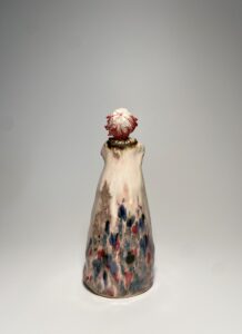 The Whispering Muse: A Handcrafted Jingdezhen Figurine Kissed By Fire 3 Mystic eye symbol on unique porcelain art gift with natural kiln colors