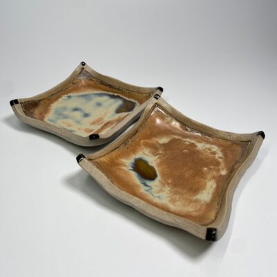 Modern pottery tray with keys in coastal living room - Functional art decor