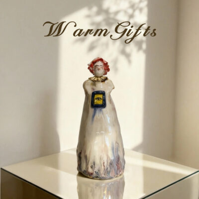 doll02 Handcrafted Pottery Figurine Jingdezhen ceramic sculpture side view capturing flowing gown movement