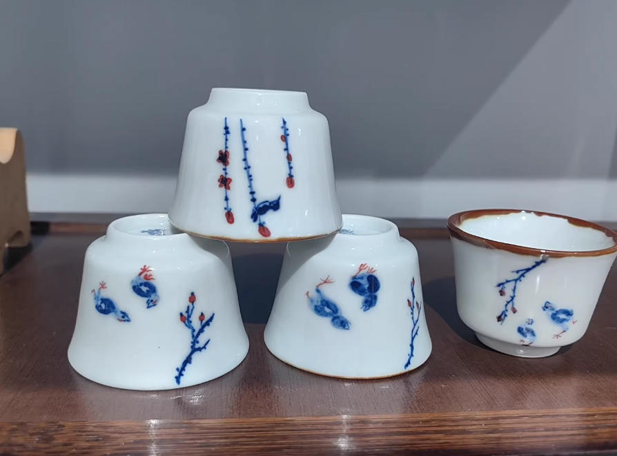 Wechat_2025-09-11_093455_433 Jingdezhen porcelain teacup profile - ivory glaze with cobalt floral details