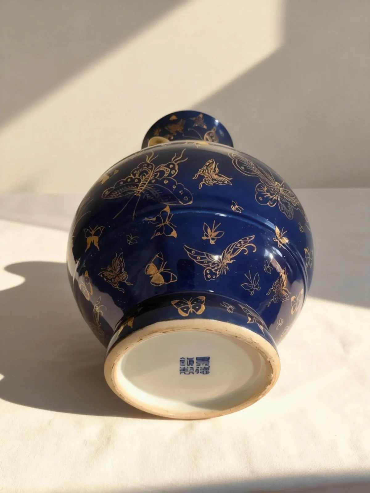 Antique Underglaze Blue-Ground Hundred Butterflies Gold-Traced Triple-Handled Lantern Bottle