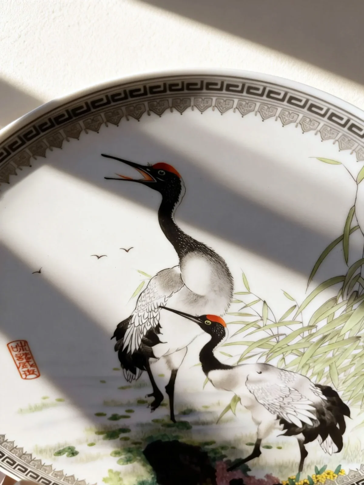 Wetland with red-crowned cranes and reeds